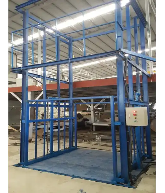 A hydraulic type cargo lift in a warehouse/factory
