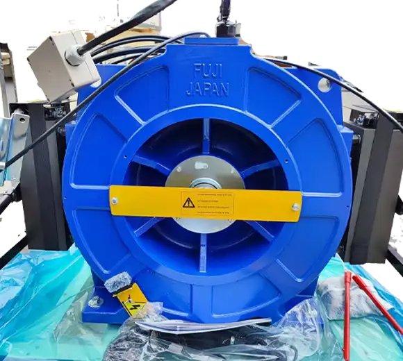an elevator traction motor, brand name written fuji japan